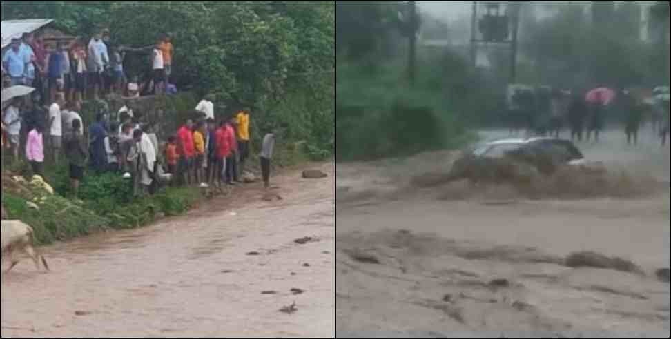 car washed away in water overflow in kotdwar