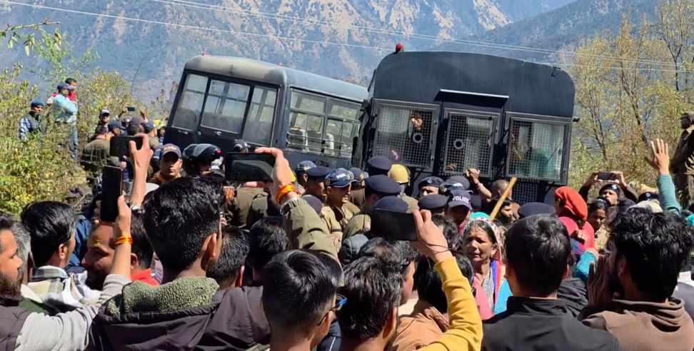 PTCUL Company: Woman saving their land from PTCUL Police doing Company Duty