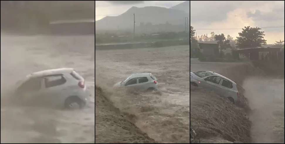 car washed away in drain: Car washed away in rain drain in Vikasnagar