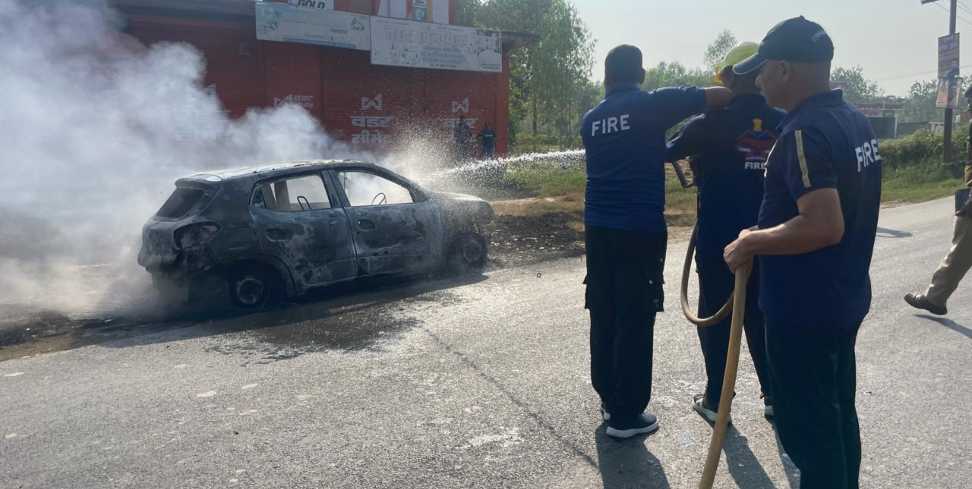 Moving car caught fire: Moving car caught fire two people barely survived