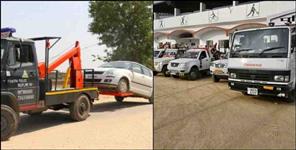 image: Crane will pick up the car parked in no parking in Dehradun