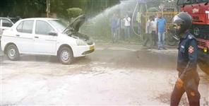 image: Fire in a moving car in Dehradun