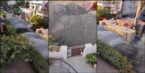 image: Residents House Arrest After Road Blocked by Construction Material