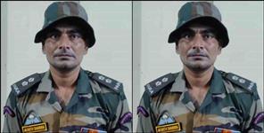 image: Suspect arrested in army officers uniform outside Dehradun IMA