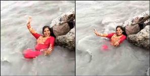 image: Video of woman washed into canal in Haldwani
