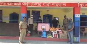 image: Journalists donate grocery in pauri garhwal