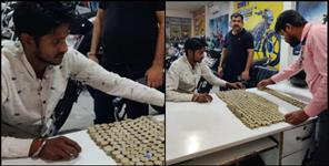 image: Husband collects coins to give scooty to wife in Uttarakhand