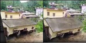 image: Two storey house Collapse in river Kirtinagar tehri garhwal