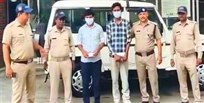 image: two arrested for robbing woman