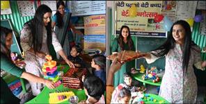 image: Tehri DM Mayur Dixit wife celebrates birthday in Anganwadi