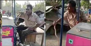 image: Man eat alive snake in haldwani nainital