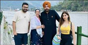 image: Navjot Singh Sidhu in Rishikesh with wife