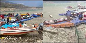 image: Many boats damaged due to storm in Tehri Lake