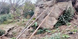 image: Joshimath Sinking huge rock leaning towards population