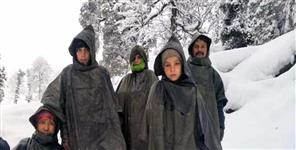 image: Children spent the night in a cave with their mother stuck in the snow
