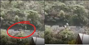 image: Bike rider narrowly saved in Nainital