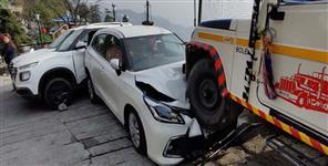 image: loading jeep hit 3 cars and a scooter parked outside a hotel