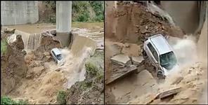 image: Car got washed away in strong water flow in Kirtinagar