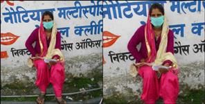 image: Coronavirus Uttarakhand:tehri women sitting in road due to hospital negligence