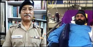 image: DGP Anil Raturi say thanks to SI Harjeet Singh by wears his nameplate