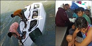 image: Car Breaks Railing Fell in Ganga Haridwar Police Saved 5 Lives