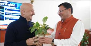 image: CM Pushkar Singh Dhami and Anupam Kher meeting in Dehradun