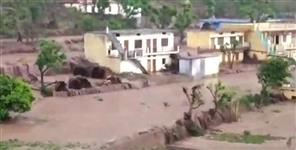image: Flood in Kumrada village of Uttarkashi