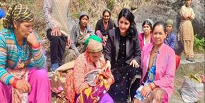 image: Woman gives birth to twins on river bank