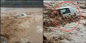 image: Two cars washed away in the flow of the river in Haridwar