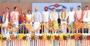 image: Pushkar Singh Dhami takes oath as Chief Minister with new cabinet