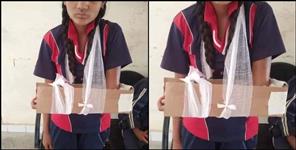 image: Pauri Garhwal Rikhnikhal Girl hand fractured cardboard