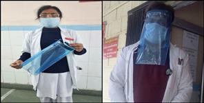 image: nurses made face cover By plastic cover of books in gopeshwar