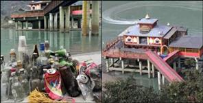 image: Empty liquor bottles near the Dhari Devi Temple