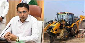 image: Dehradun District Magistrate Savin Bansal action on illegal wall