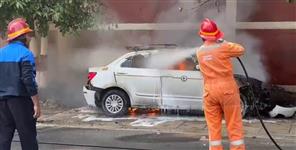 image: Burning car in Dehradun 3 people barely survive