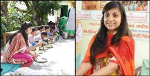 image: Chamoli DM shared mid day meal with students sitting on floor