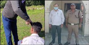 image: teacher cut hair of students in haridwar
