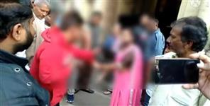 image: haridwar women beat youth in market video viral