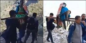 image: Old woman had to carried 3 km to hospital on shoulder