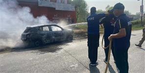 image: Moving car caught fire two people barely survived