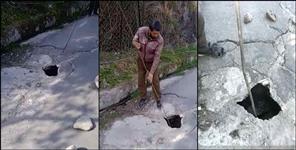 image: Joshimath Sinking Deep potholes on Badrinath Highway