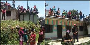 image: Villagers stopped the family from home quarantine