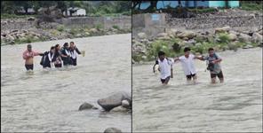 image: Students going to school risking their lives
