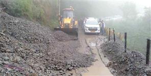 image: Debris on the road due to heavy rain in Nainital