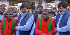 image: Dhan Singh Rawat and Ganesh Godiyal hugging each other
