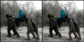 image: People took Woman to hospital between snowfall in chamoli