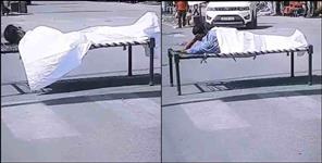 image: boy made reel by placing bed on the road In Dehradun