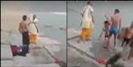 Pandit ji beat boys on banks of river Ganga in Rishikesh