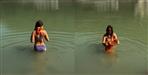 Foreign woman bathes in the Ganges in bikini