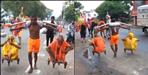 son bring his mother father to haridwar in palki video